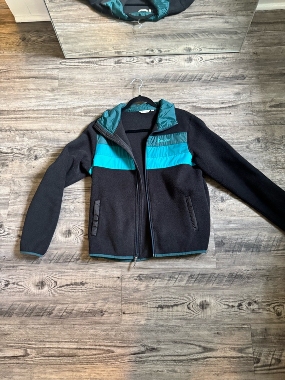 cotopaxi Black Fleece Jacket with Teal Accent Panels